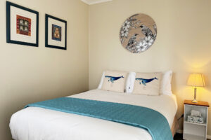 Tastefully decorated bedroom in vacation rental accommodation.